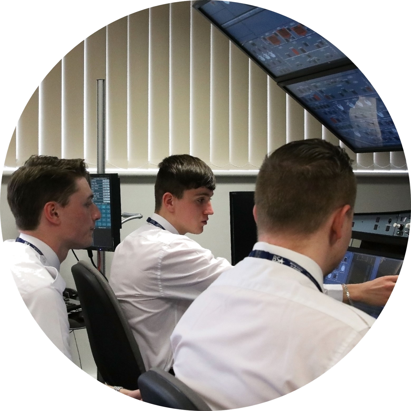 group of learners at an aircraft simulator